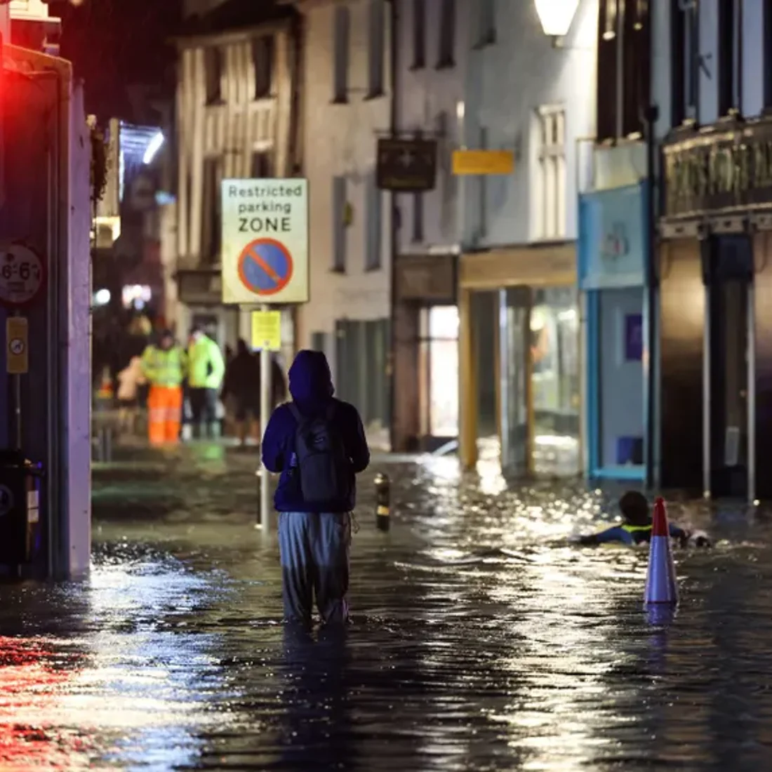 Floodwater in a Looe street at night